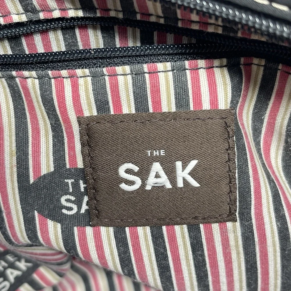 The Sak Black Woven Small Textured White Stitching Shoulder Bag Adjustable Strap
